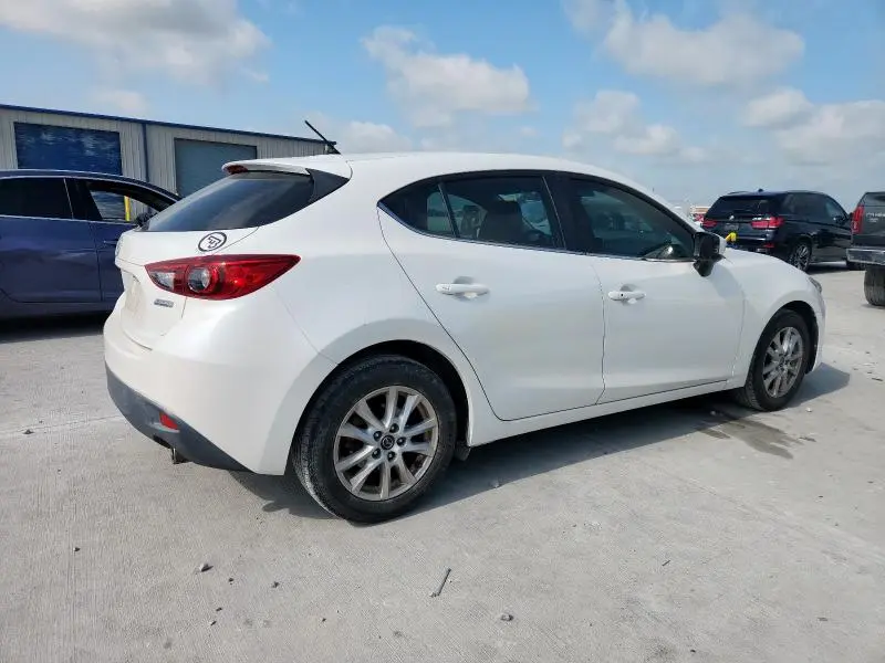 2015 MAZDA 3 TOURING  