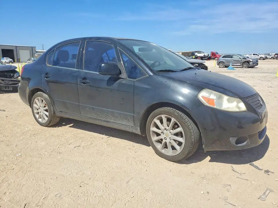 2011 SUZUKI SX4 LE  